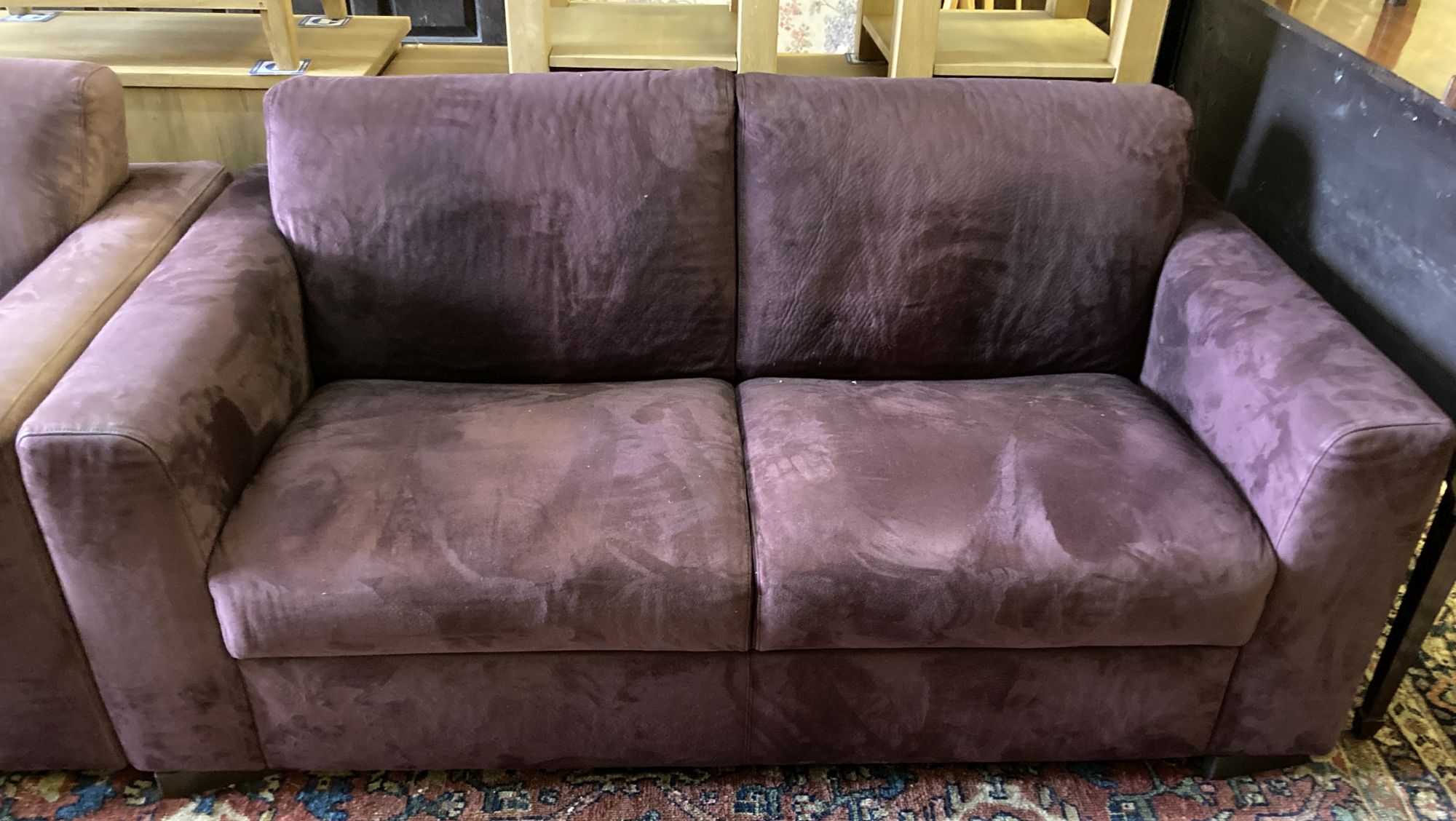 A pair of modern two-seater settees covered in suede, length 170cm, depth 94cm, height 80cm